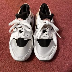 Nike huaraches pink, grey, and white.